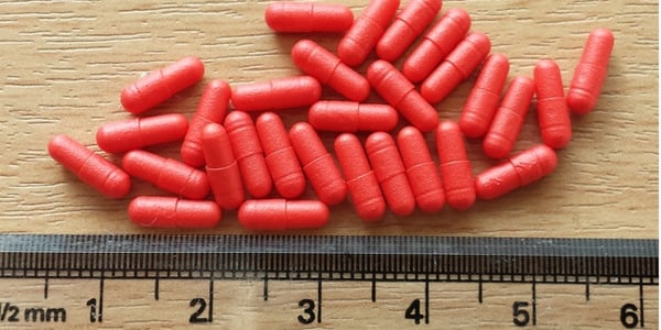  A small batch of size 9 capsules coated with the Caleva tablet and pellet coater